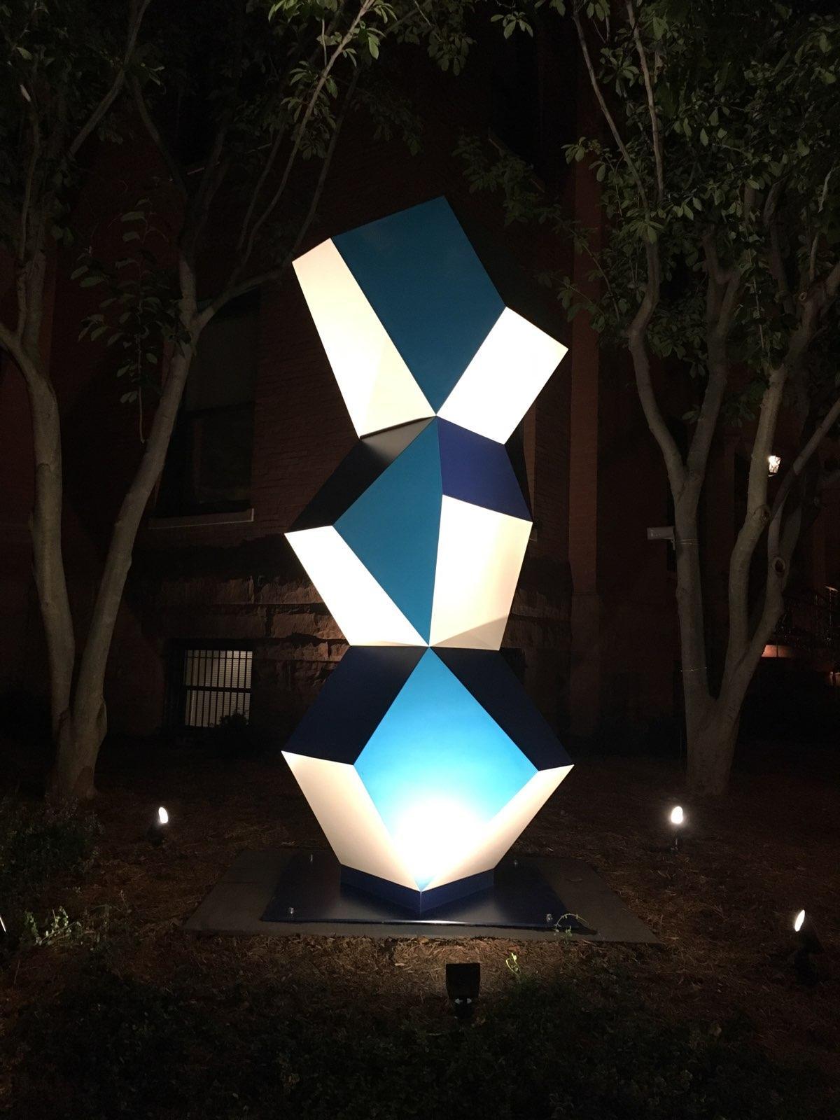 Heavy Metal Stack: Fat Cyan Three at night