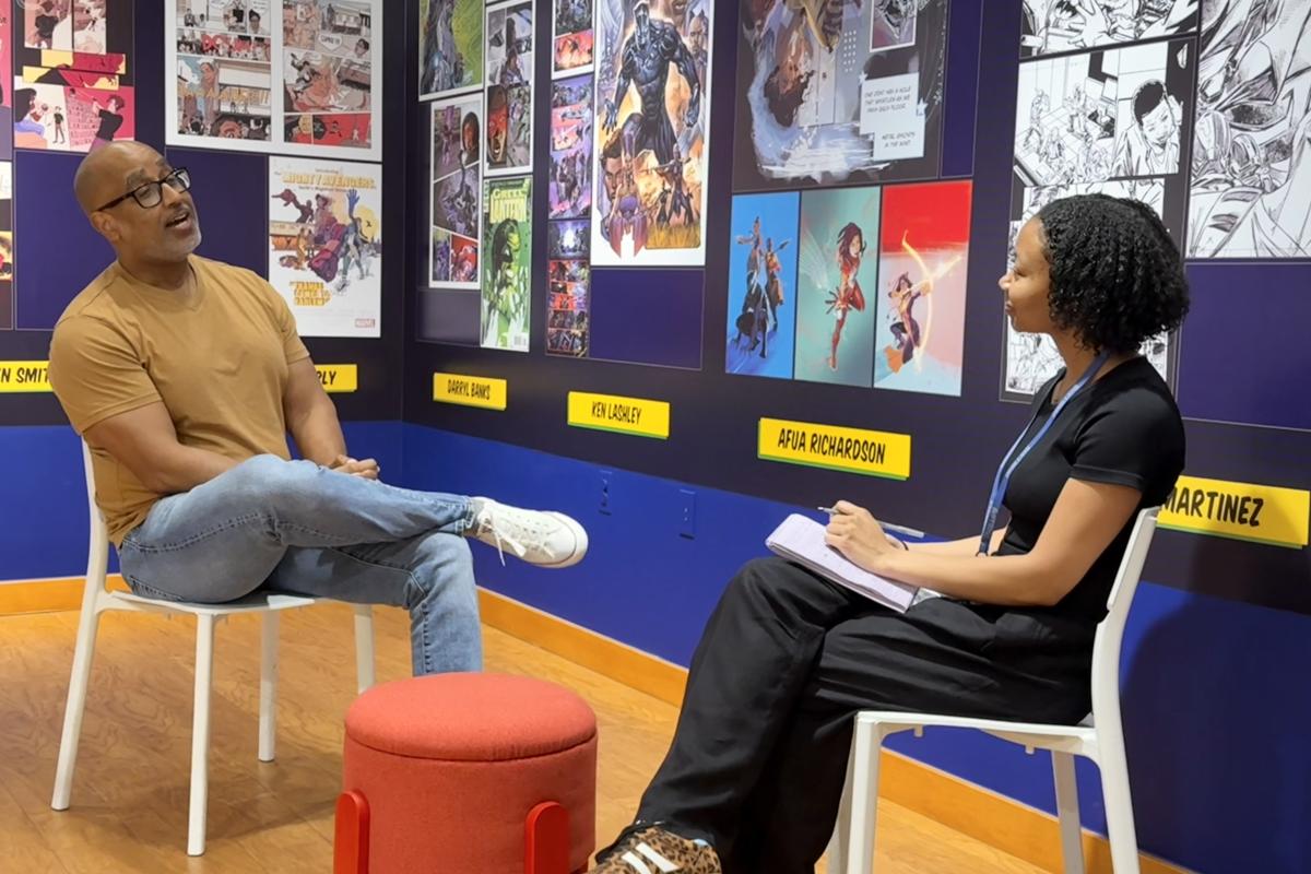 Shawn Martinbrough and Chantel Bennet chatting in the Brotherman to Batman exhibition